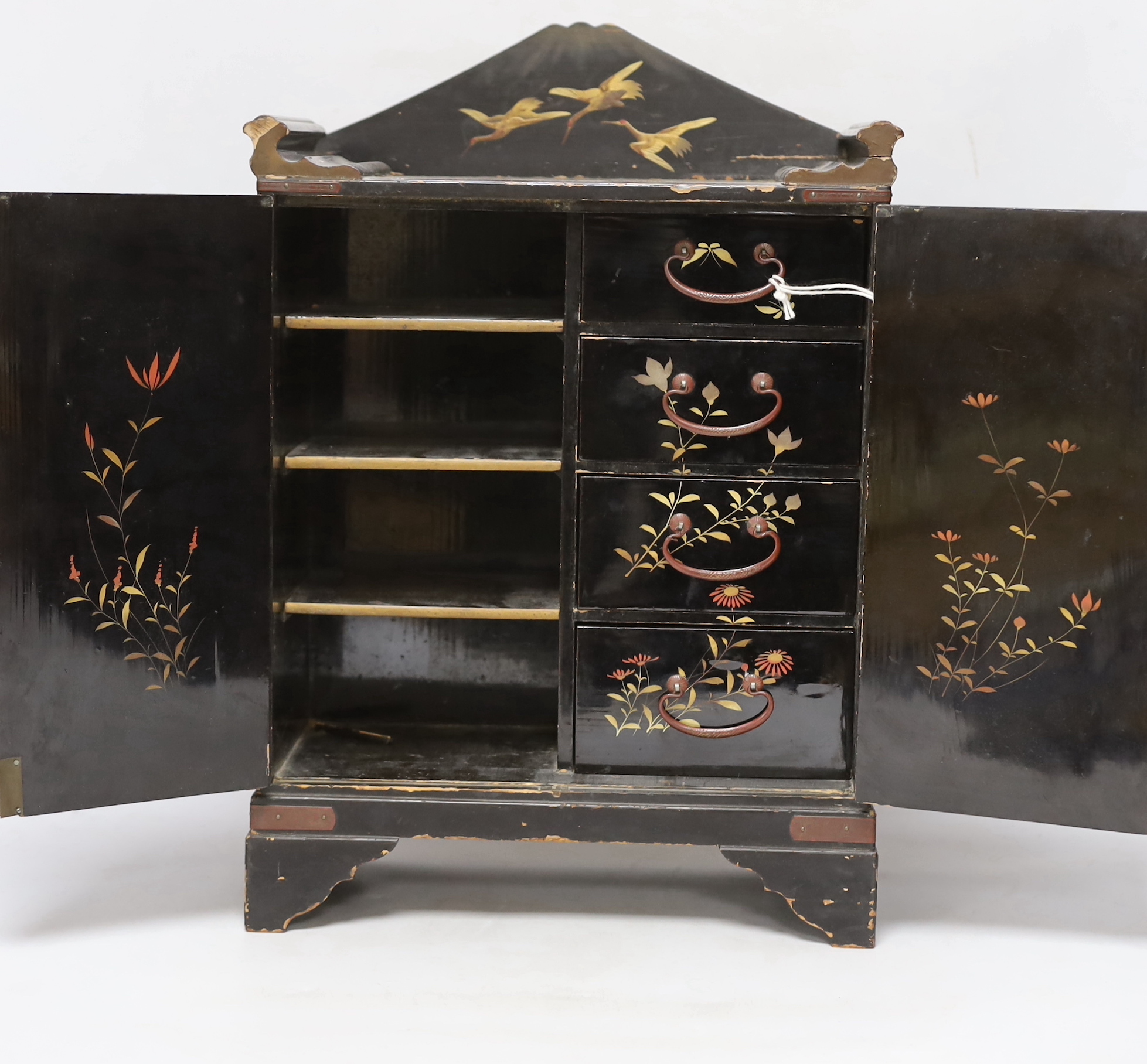 A Japanese casket with fitted interior, lacquered with birds and flowers, 42cm high